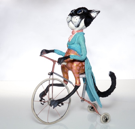 кіт-велосипедист